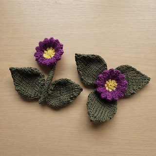 Knitted flowers for brooches or knitted home decor
