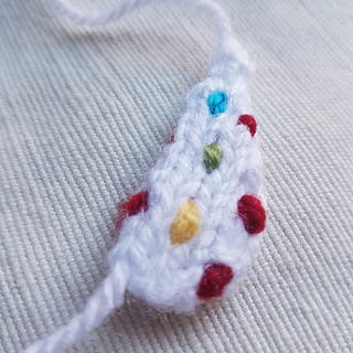 Knitted pudsey bear eyepatch piece