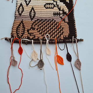 Falling leaves woodland wall hanging by Hookanory - planning the layout of the hanging leaf applique shapes.