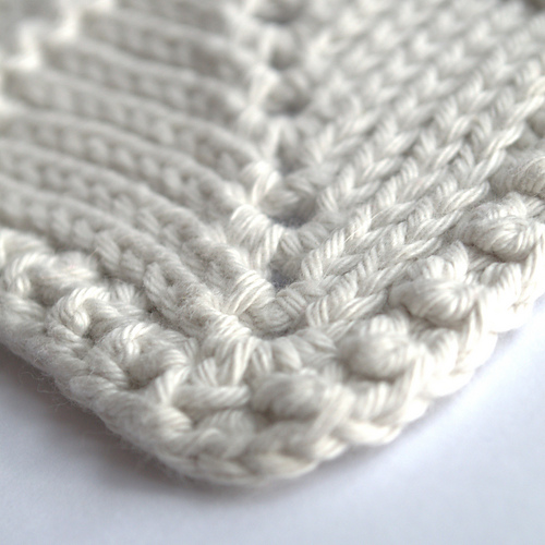 A corner of crochet square napkin