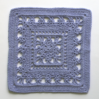Intricate crochet motif pattern photographed flat, full 11-inch square