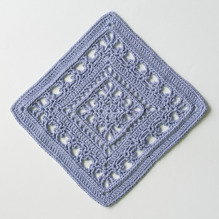Baroque-style lace crochet pattern square in blue cotton, full size view