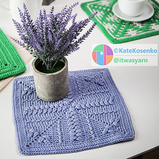 Sure! Here's a concise version with the focus on the crochet pattern:
﹥ A lavender crochet square displayed with flowers and a teacup in the background.