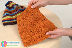 Close-up of DK crochet neck warmer texture.