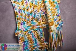 V-stitch crochet scarf draped down