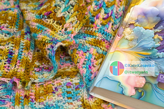 Bold stitch detail on colorful crochet scarf