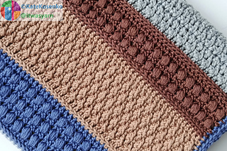 Colorful patchwork crochet texture pattern close-up