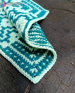 Prism Square crochet square draped on a stump