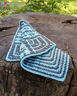 Draped Pulse crochet square with geometric design.
