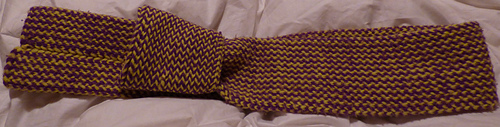 cuff rolled from one end to show inside