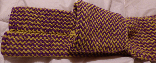 cuff rolled from one end to show inside - a tad closer