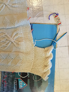 2018-31-01 closeup of beginning of added border showing placement of stitch markers where future cables should be made