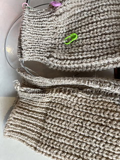 2023-12-17 one cuff almost reknit (top) and original.