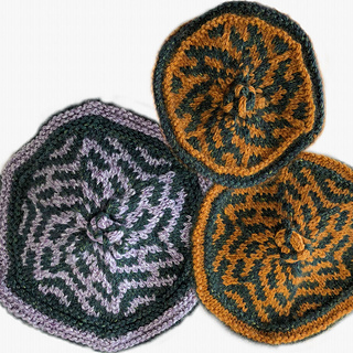 A trio of Crowns! The pattern is the same, but the number of stitches creates a unique motif for each size.