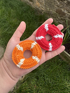 "Life Ring Marble Fidget" in two colour schemes.