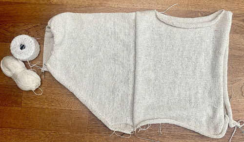 Adding the first sleeve, almost at the cuff