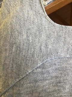 Showing the wedge of stitches I added to round the back neck. 