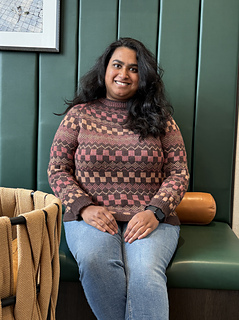 I am wearing a size 5, knit with 0" of ease and tapered sleeves