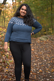 I am wearing a size 5, knit with 2" of ease