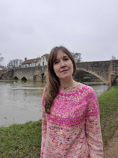 Sarah is wearing a size 2 sweater