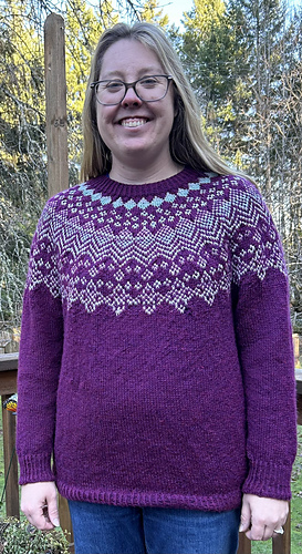 Kaitlin is wearing a size 3 sweater