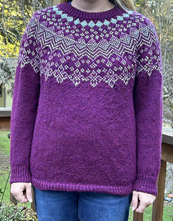 Kaitlin is wearing a size 3 sweater