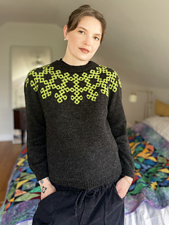 Micah is wearing a size 3 sweater