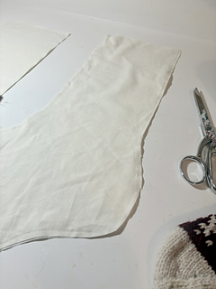 To line, cut fabric to fit shape with 1/4" seam allowance (adding 2" extra on the cuff).
