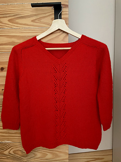 You can see how the back neck dips lower than the tops of the shoulder (saddle). This is how a very open neckline accompanies a sweater that stays put.