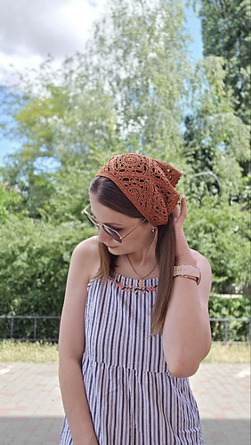 Finished LB.KNITS crochet bandana worn from the side