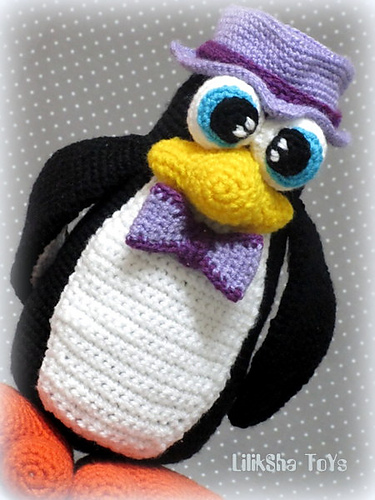 Penguin wearing a hat and a bow tie. photo 4