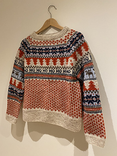 Denne har en annen bord på ermene enn oppskriften 