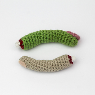 green finger: worsted weight with 3.5mm(E) hook; tan finger: DK weight with 3mm hook