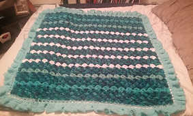 Crocodile "Hug" is almost complete. Last thing to do is stitch the heart onto the hug. Looking at the front it should be stitched onto upper "right" corner (my preference). 