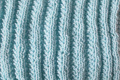 Ravelry: Zipper Rib Stitch Dishcloth pattern by Marie Segares