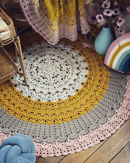 Fiddlesticks Finch floor rug version used 15 skeins. I skipped rounds 34-39, completed rounds 40-46 then finished off with a fan of dc7 in each ch2-sp