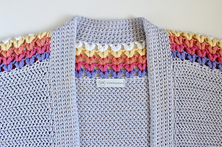 Collar of a grey Sundae Cardigan showing the accent puff stitches along the top.