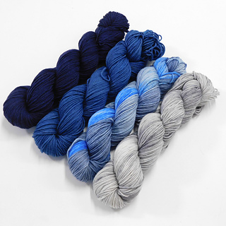 Folkestone Harbour Yarn Merino Blend DK. 
Colours L-R: Midnight, Petrol, Jarvi, Cloudcover.