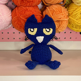 9" tall, made using Red Heart