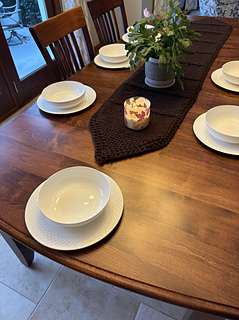 I'm testing a place setting at the end of the table. The intended recipient's table is 4" longer than ours. This is yet to be blocked and ends woven in. I spit-spliced all of the ends, so there are only two to weave in.