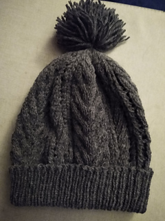The final hat with the re-knitted brim so now it fits.