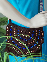 Missy Mannequin is modeling her new bag.