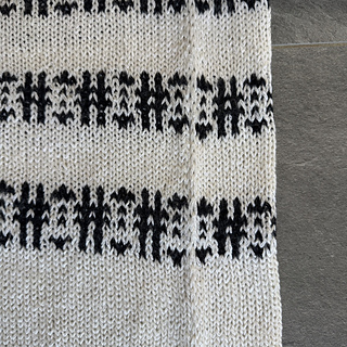 False side seams (two alternating slip stitch columns)