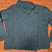 Finished, blocked, with facings and linings and snaps.