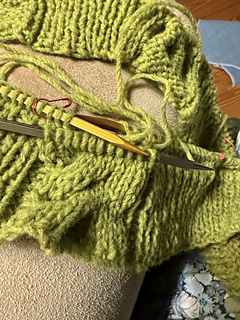Be SURE to not do what I did:  accidentally use the same chart for both sides of the front.  I discovered this 13 rows after the first cable.  I managed to (OMG, I'm getting better at this stuff) unravel 16 stitches down 13 rows and re-knit it, cabling correctly!  I used DPNs and, if needed, a crochet hook to work the last stitch or two.  I then used the tip of the DPN to even out the yarn so it wasn't tight on the right and loose on the left.  I re-worked all rows from the front (the joy of sliding a DPN from one end to the other).  Hope this helps.