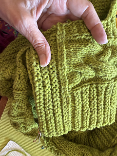 I really like the double row of bind off because it visually weighs about the same as the two rows of reverse stockinette.  