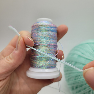 Hold thread against contrast colour for best effect