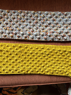 The yellow scarf was made with Malabrigo Arroyo and a size 3mm hook which is why it appears smaller