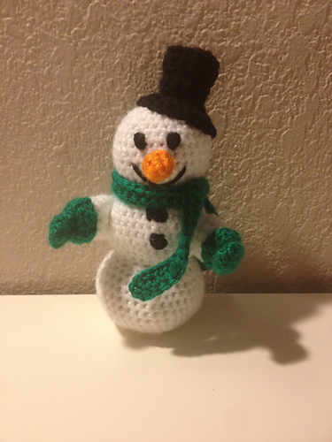 Snowman with mittens photo 1