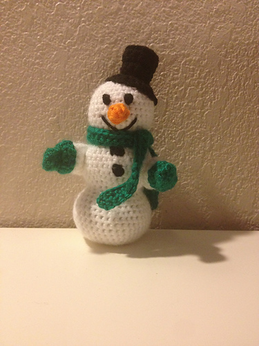 Snowman with mittens photo 3